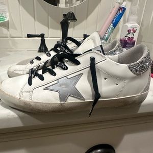 Size 8. Gently used Golden Goose sneakers. Best offer
